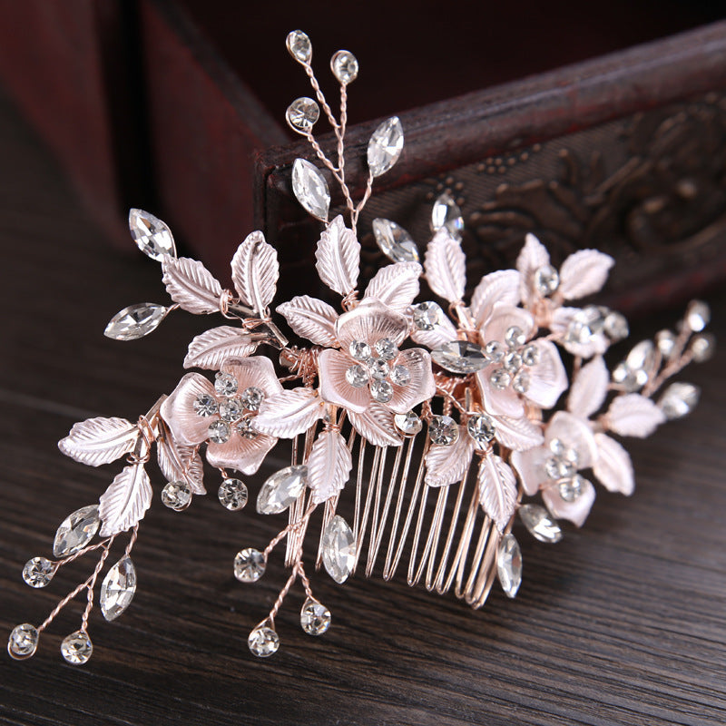 Luxurious golden hair accessory with leaves and flowers for party or wedding