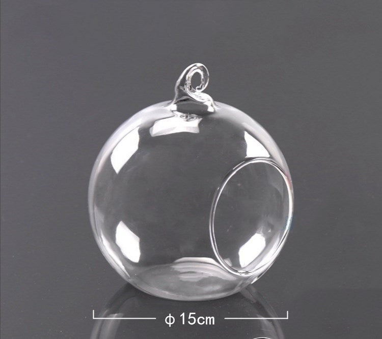 Hanging glass art for candles and plants