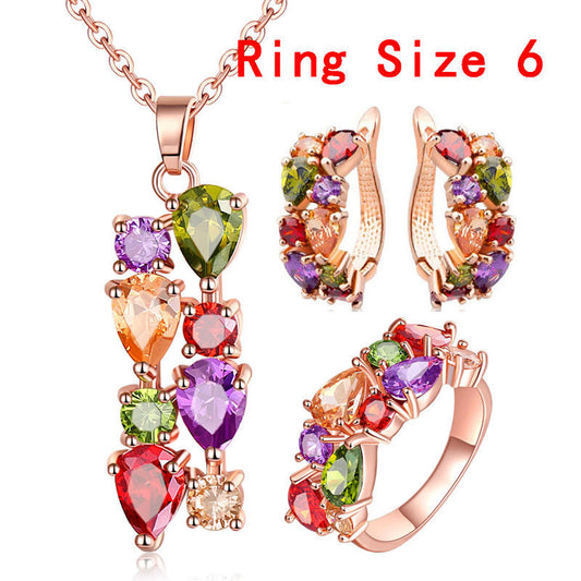Lyxigt smyckeset med regnbågsfärgade stenar – halsband, örhängen & ring