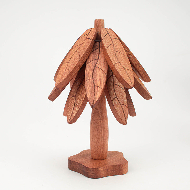 Julgransformade underlägg i massivt trä – naturlig värmetålighet med elegant design