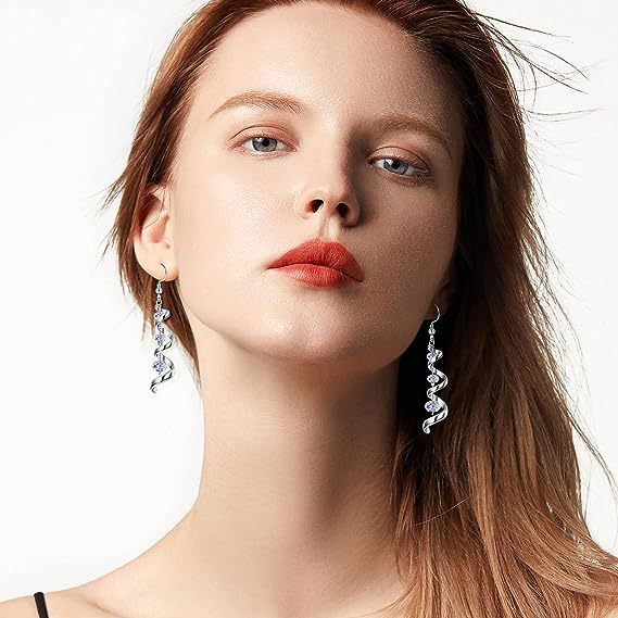 Spiralformade Örhängen med Tre Glasstenar - Modern Elegans med Glittrande Rörelse