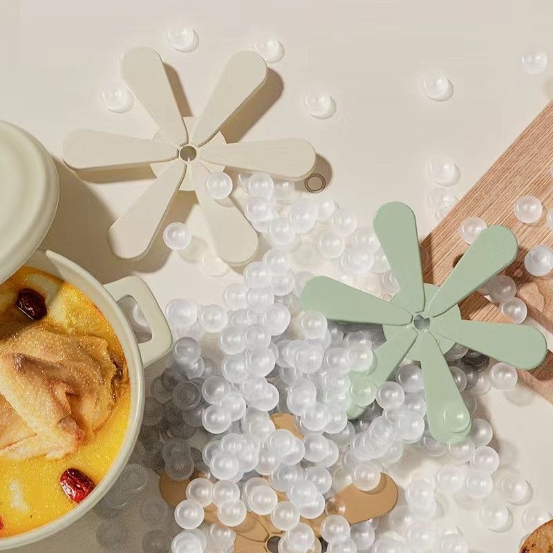 Silikonunderlägg i trädform – smart, stilrent och värmetåligt kökstillbehör