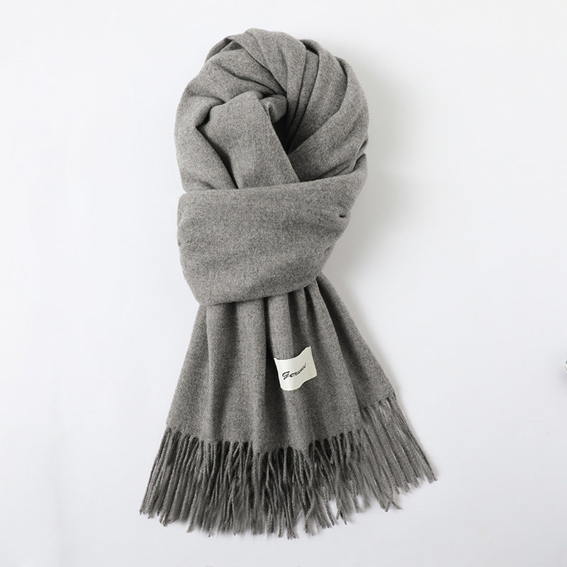 Elegant höst- och vinter sjal i mjuk viskos med fransar