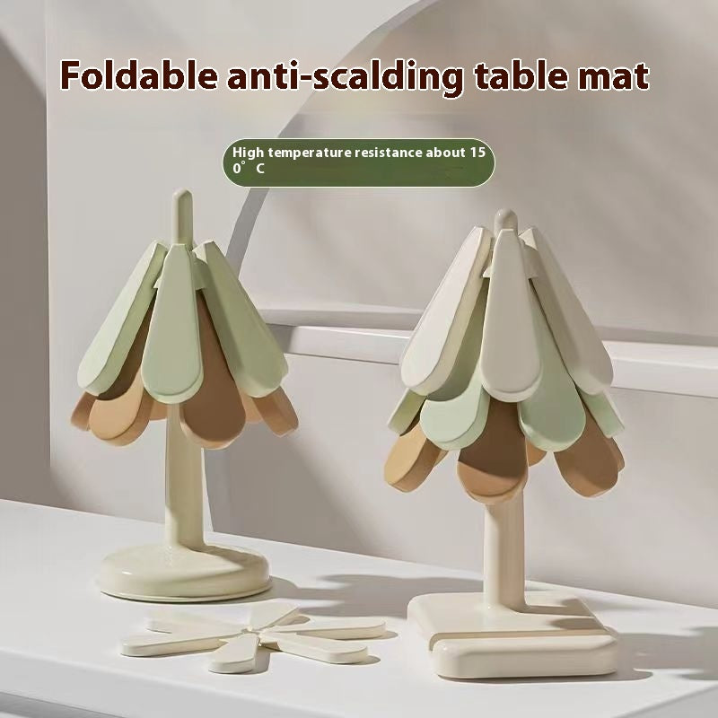 Silikonunderlägg i trädform – smart, stilrent och värmetåligt kökstillbehör